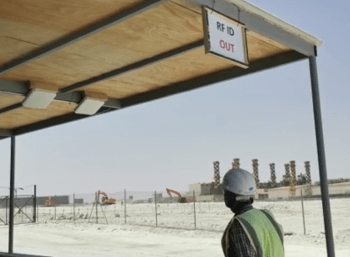 Worker passing through RFID exit point