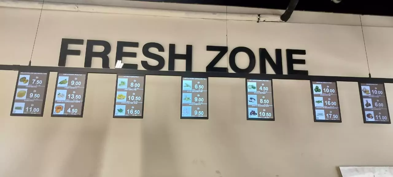 Talal Supermarket fresh section with electronic shelf labels and digital displays