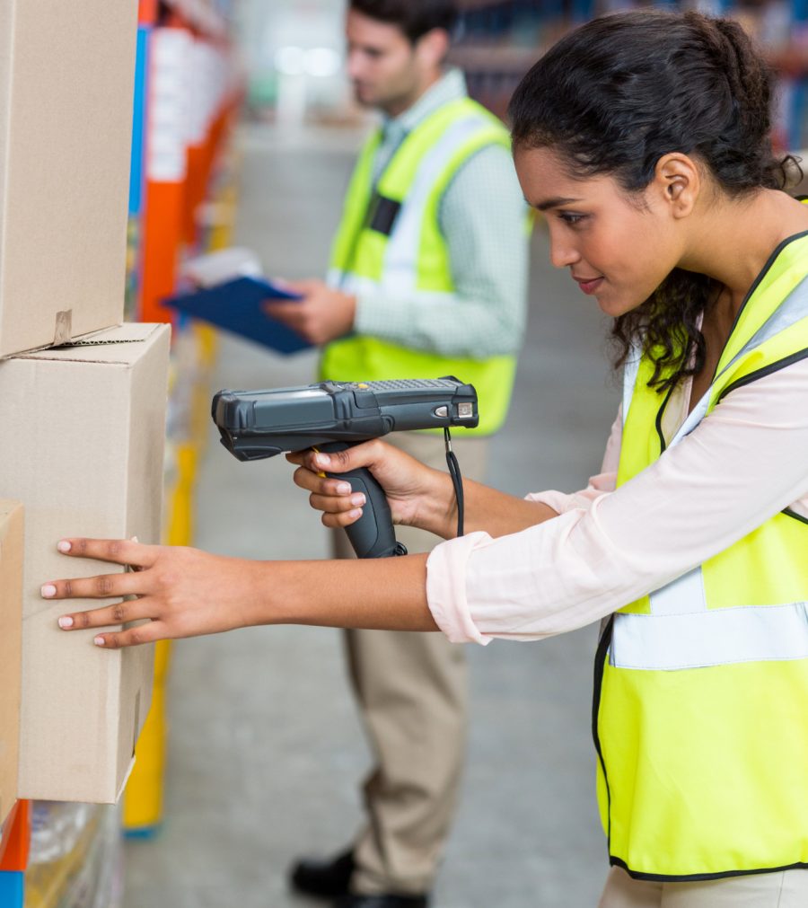 female-warehouse-worker-scanning-box